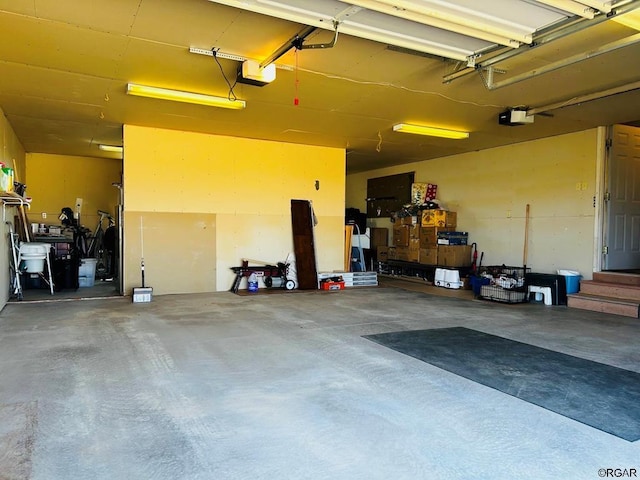 2 Inverness Ave, Westcliffe, CO 81252 - garage featuring a garage door opener