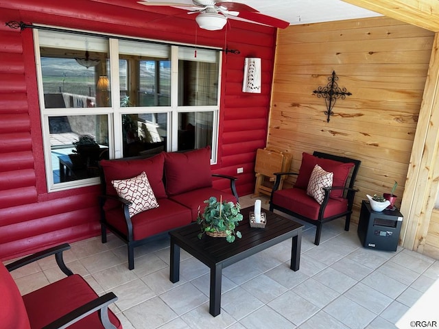 2 Inverness Ave, Westcliffe, CO 81252 - living room with ceiling fan, tile patterned flooring, and log walls