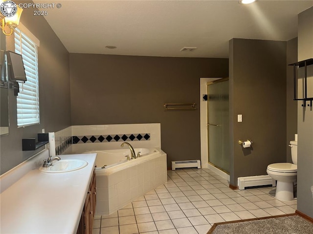 5 Cory Ln, Florence, CO 81226 - full bathroom featuring tile patterned flooring, toilet, baseboard heating, and a baseboard heating unit
