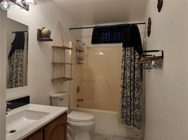 5 Cory Ln, Florence, CO 81226 - full bathroom with vanity, toilet, a textured wall, and shower / bath combo