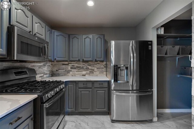 5 Cory Ln, Florence, CO 81226 - kitchen with stainless steel appliances, gray cabinets, decorative backsplash, and marble finish floor