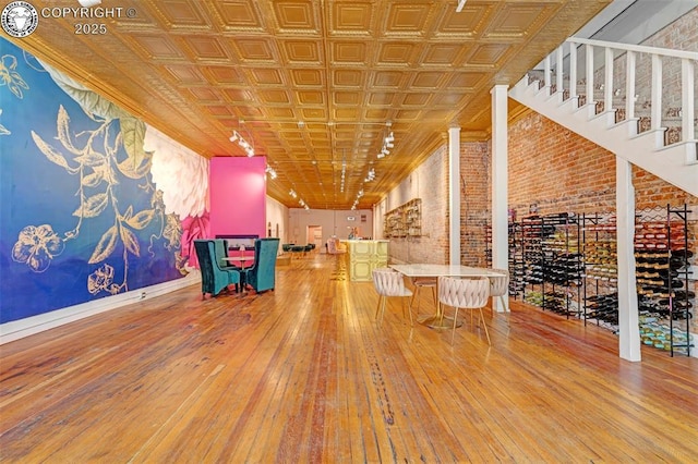 122 W Main St, Florence, CO 81226 - interior space with hardwood / wood-style floors and an ornate ceiling