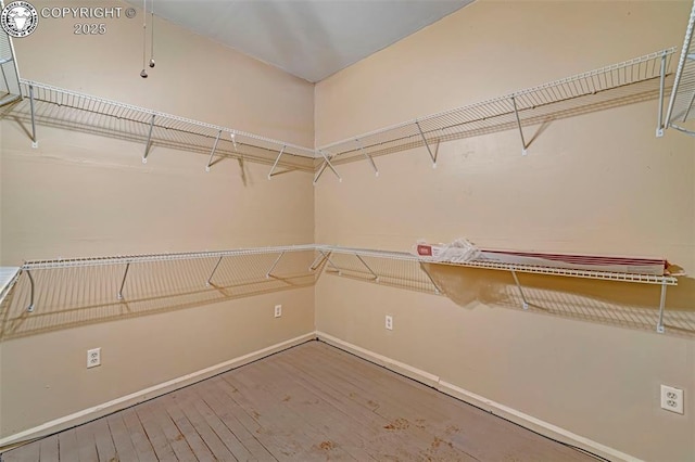 122 W Main St, Florence, CO 81226 - spacious closet with wood finished floors