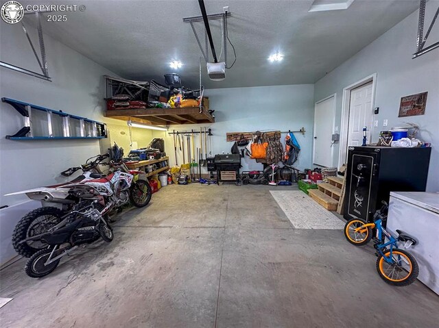 garage featuring a garage door opener