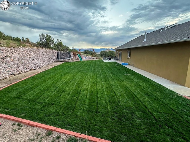 view of yard featuring a playground