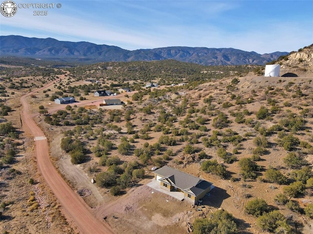 bird's eye view with a mountain view