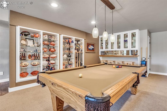 recreation room with carpet flooring