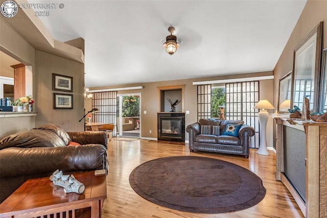 living room with light hardwood / wood-style flooring