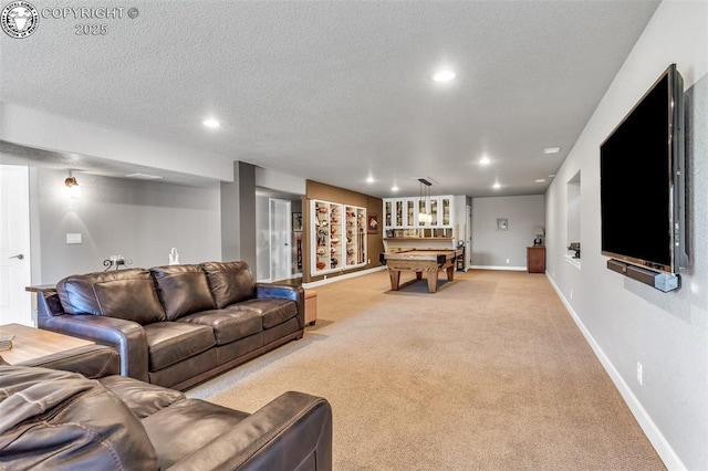 carpeted living room with a textured ceiling