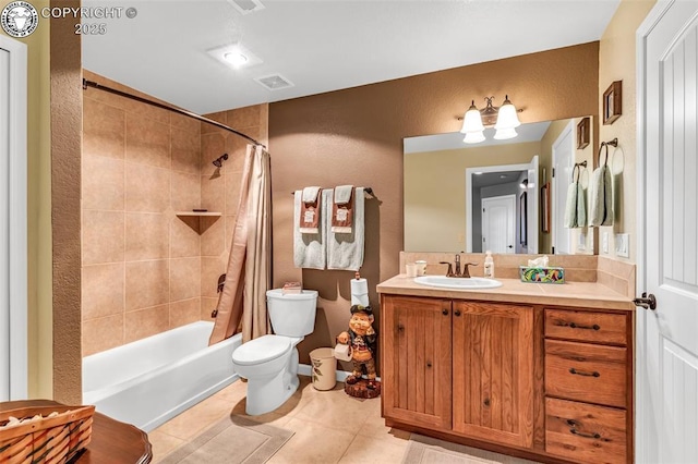 full bathroom with tile patterned floors, toilet, vanity, and shower / bath combo