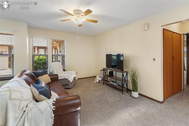 1125 Barr Ave, Canon City, CO 81212 - living room with carpet and a ceiling fan