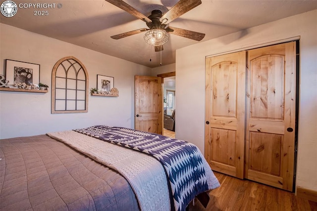 bedroom featuring ceiling fan and light wood-style floors