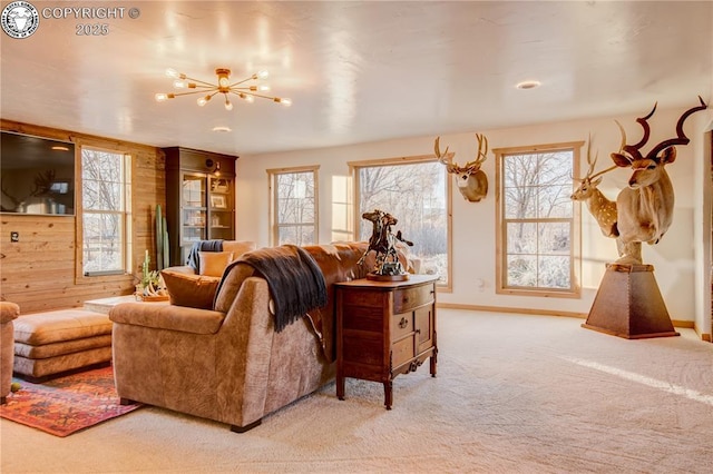 living area with carpet and baseboards