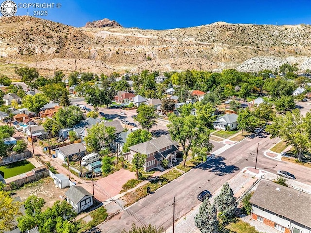 aerial view with a mountain view and a residential view