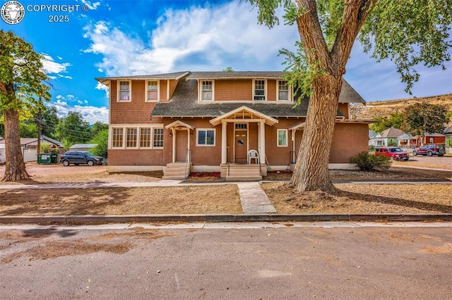 view of front of home featuring stucco siding