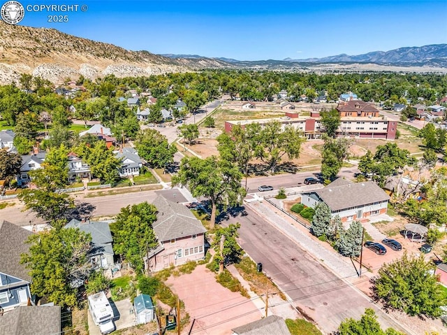 aerial view featuring a mountain view and a residential view