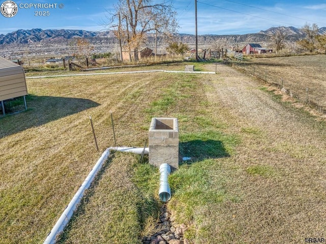 view of yard with a mountain view