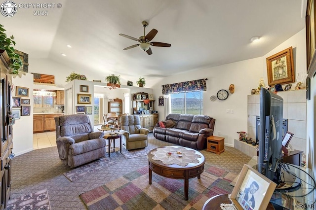 carpeted living room with vaulted ceiling and ceiling fan