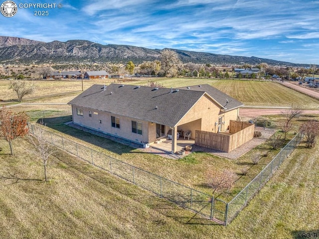 bird's eye view featuring a mountain view and a rural view