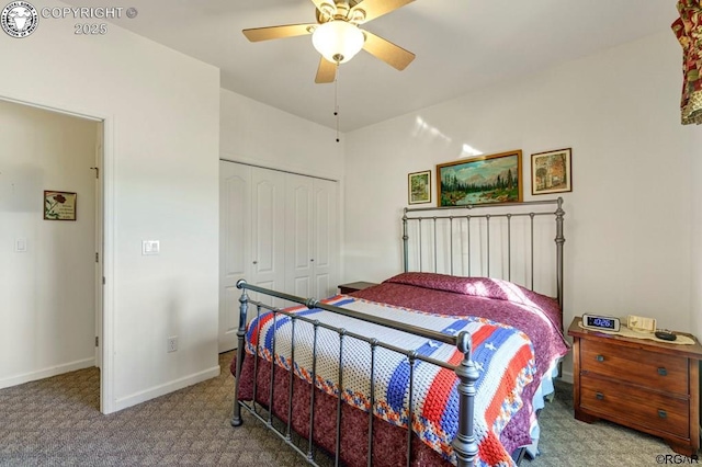 bedroom with ceiling fan, carpet, and a closet