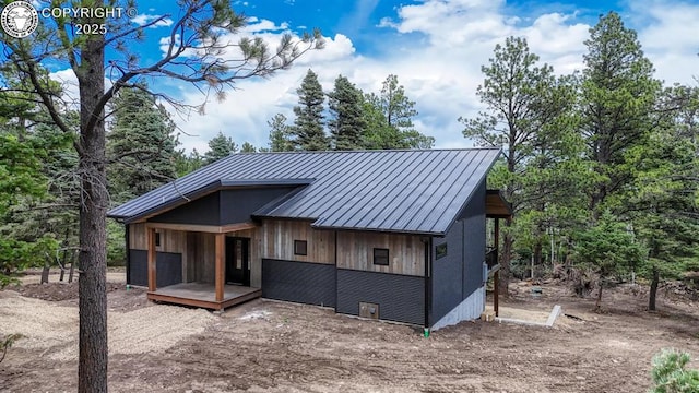 79 Terrazo Abajo, Westcliffe, CO 81252 - view of front of house with a standing seam roof and a metal roof