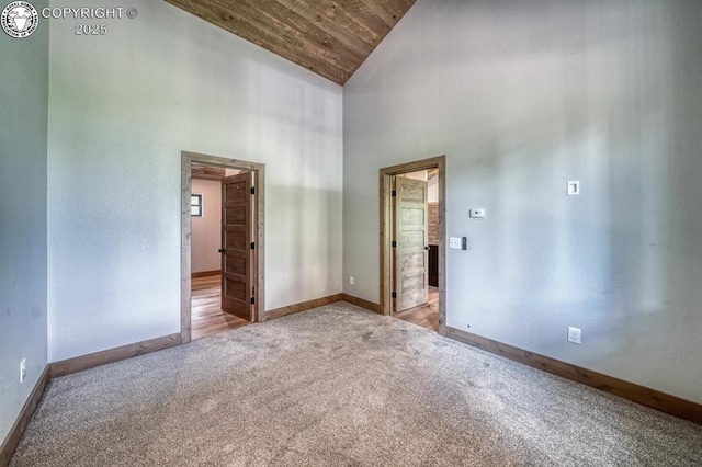 79 Terrazo Abajo, Westcliffe, CO 81252 - empty room featuring light colored carpet, wooden ceiling, and high vaulted ceiling
