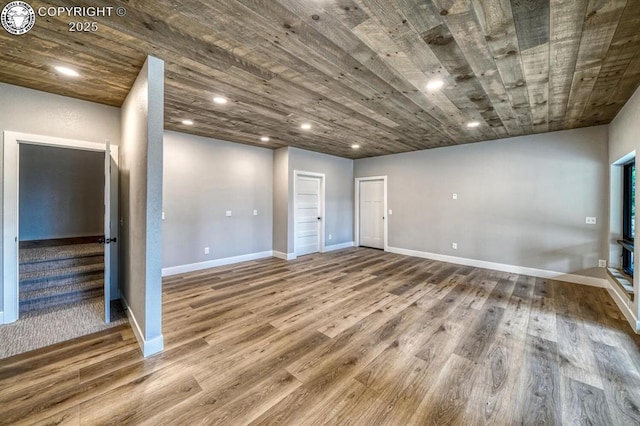 79 Terrazo Abajo, Westcliffe, CO 81252 - unfurnished living room with wood finished floors, stairs, wood ceiling, and recessed lighting