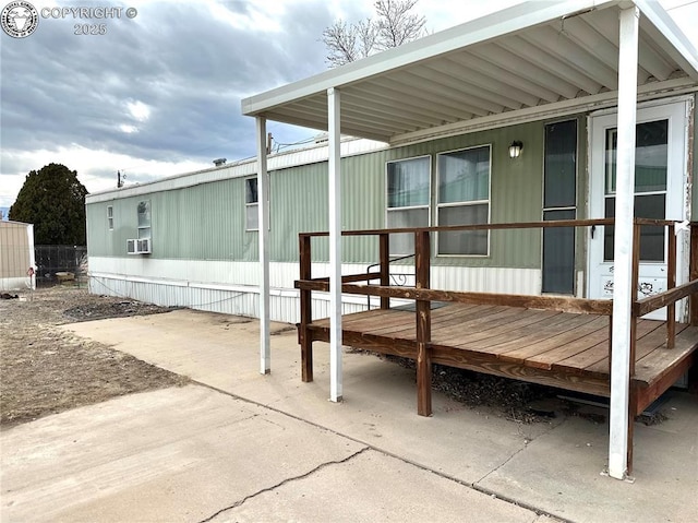 rear view of property featuring cooling unit