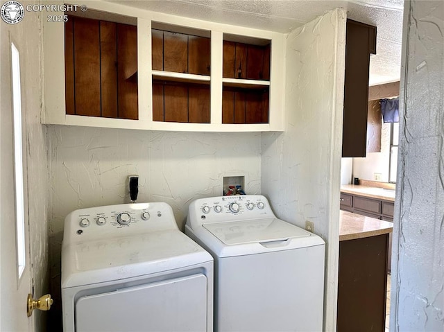 laundry room with washing machine and dryer and laundry area