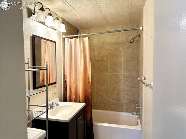 bathroom featuring vanity and shower / bath combo