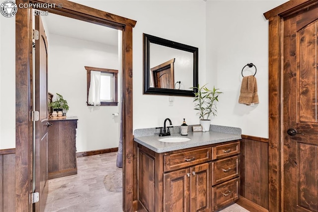 3491 County Road 215th Rd, Westcliffe, CO 81252 - bathroom featuring vanity and a wainscoted wall