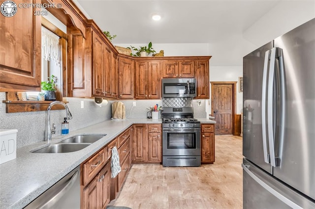 3491 County Road 215th Rd, Westcliffe, CO 81252 - kitchen with appliances with stainless steel finishes, decorative backsplash, light countertops, and brown cabinetry
