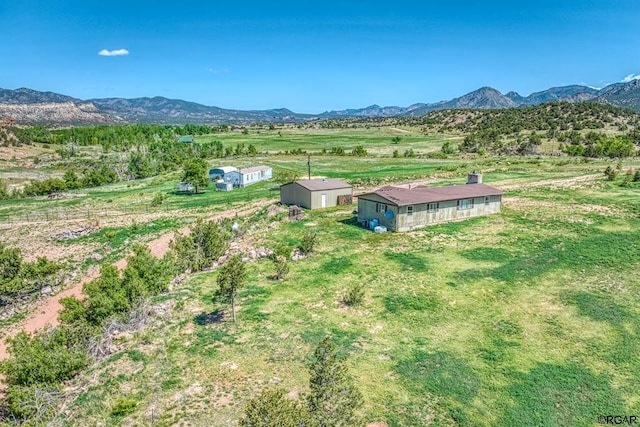 bird's eye view with a mountain view and a rural view