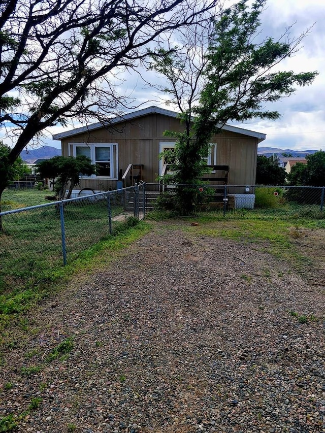 view of home's exterior with a mountain view