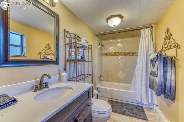 321 County Road 353a, Canon City, CO 81212 - bathroom with vanity, shower / bathtub combination with curtain, wood finished floors, a textured ceiling, and a textured wall