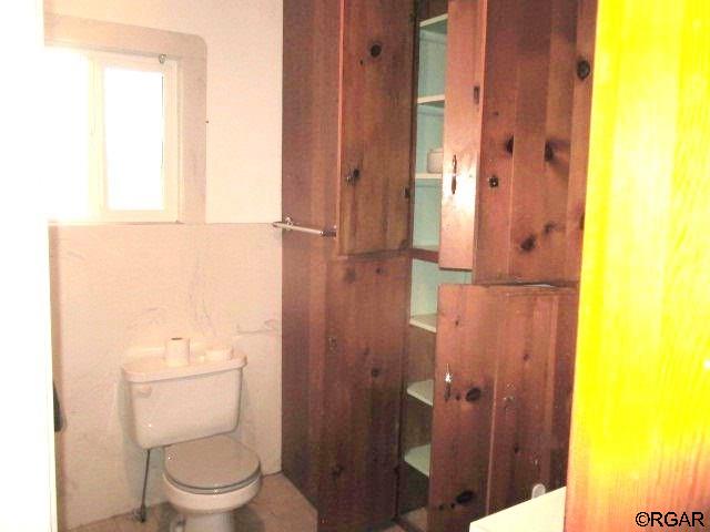 bathroom featuring toilet