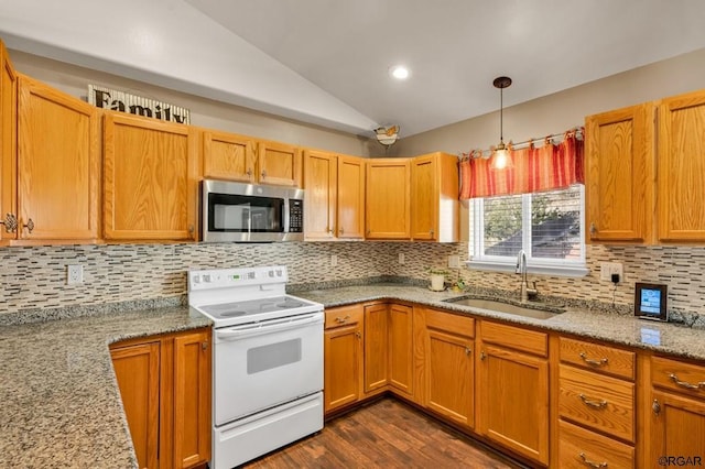 kitchen featuring lofted ceiling, sink, decorative light fixtures, white electric stove, and light stone countertops