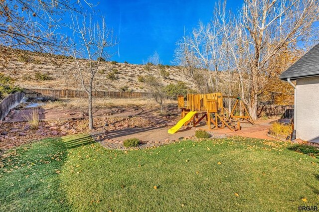 view of yard featuring a playground