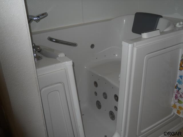 bathroom featuring washer / dryer