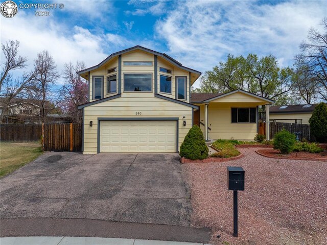 view of front of property with a garage