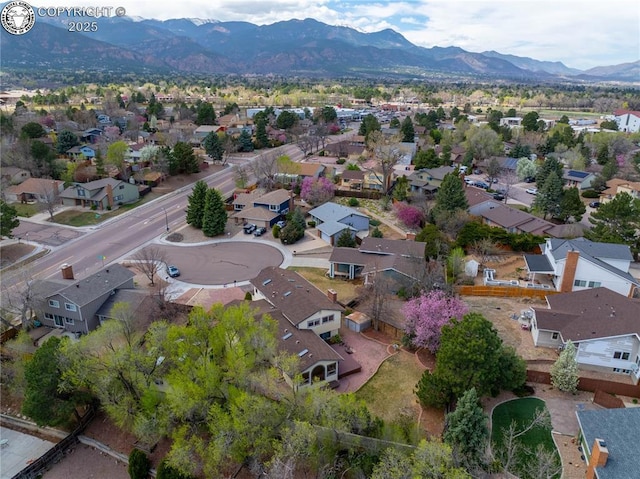 aerial view with a mountain view and a residential view