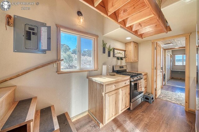 820 Little Horn Dr, Westcliffe, CO 81252 - kitchen featuring light brown cabinets, wood finished floors, and gas stove