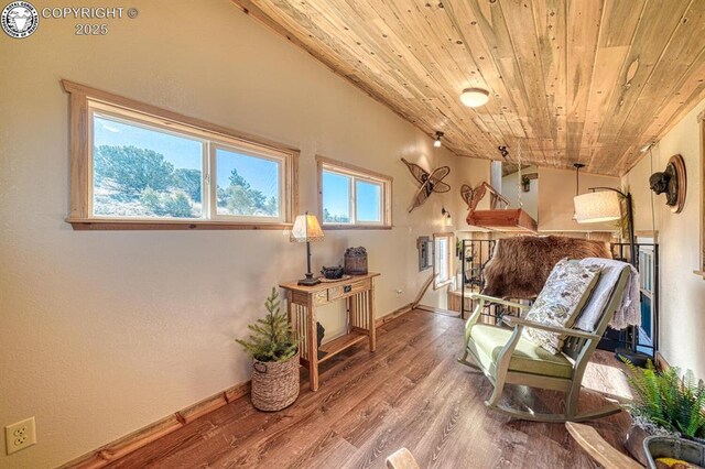820 Little Horn Dr, Westcliffe, CO 81252 - sitting room featuring baseboards, wood finished floors, and wooden ceiling