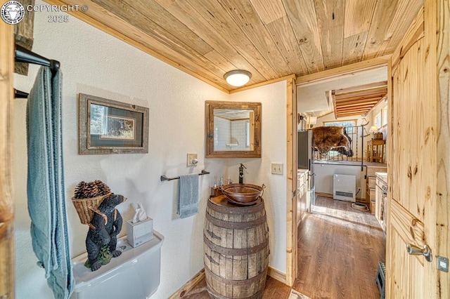 820 Little Horn Dr, Westcliffe, CO 81252 - hall with wooden ceiling, baseboards, crown molding, and wood finished floors