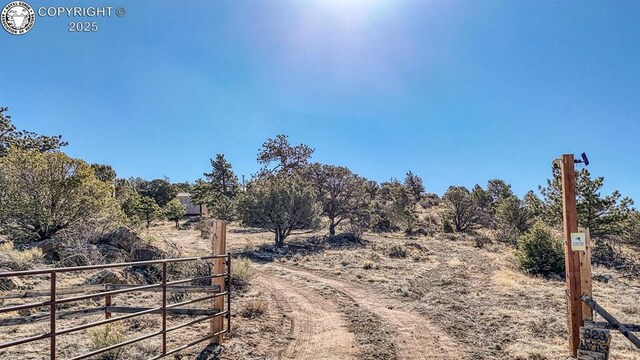 820 Little Horn Dr, Westcliffe, CO 81252 - view of yard featuring fence and a rural view