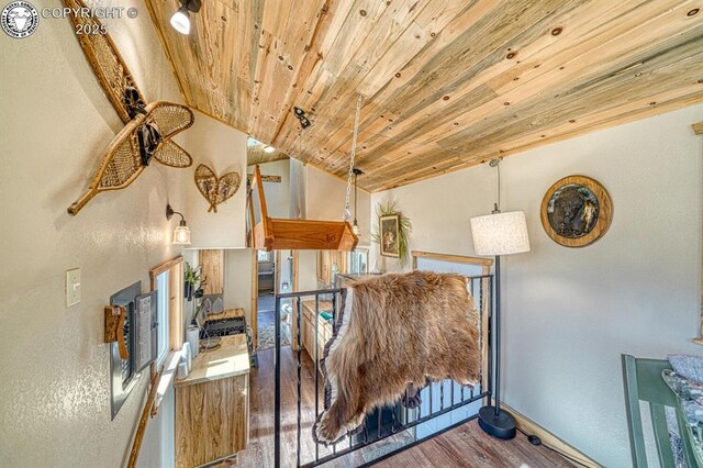 820 Little Horn Dr, Westcliffe, CO 81252 - interior space featuring wooden ceiling, baseboards, a textured wall, and wood finished floors