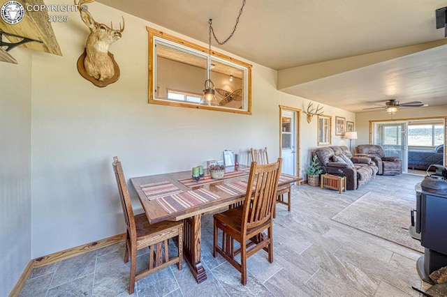 820 Little Horn Dr, Westcliffe, CO 81252 - dining room featuring baseboards and a ceiling fan