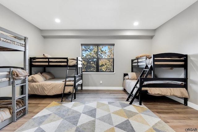 bedroom featuring wood-type flooring