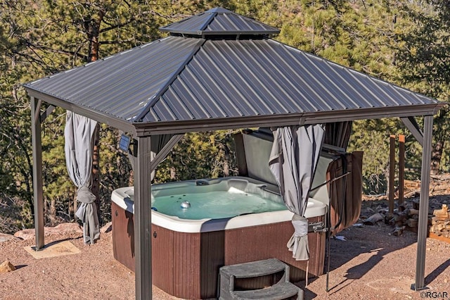 view of patio / terrace featuring a hot tub