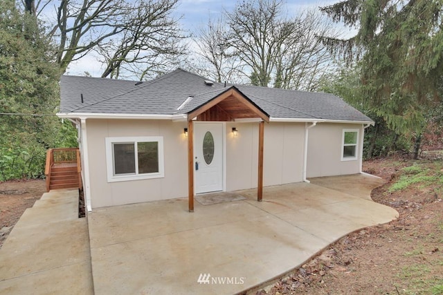 single story home with a patio